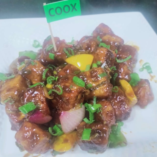 Tasty Chilli Paneer (Dry) cooked by COOX chefs cooks during occasions parties events at home