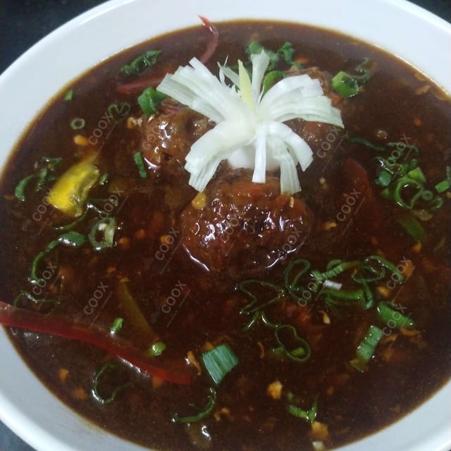 Tasty Veg Manchurian (Gravy) cooked by COOX chefs cooks during occasions parties events at home