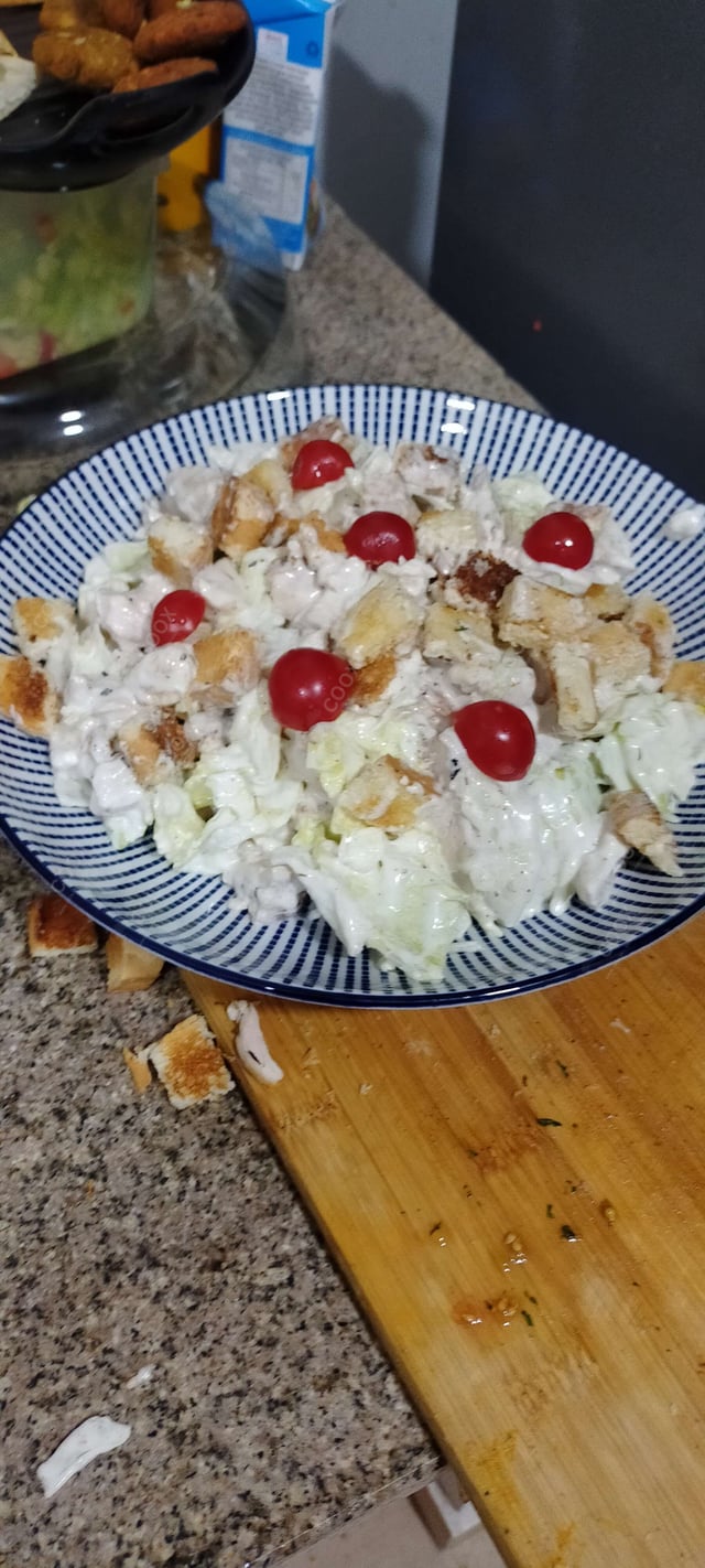 Tasty Chicken Caesar Salad cooked by COOX chefs cooks during occasions parties events at home