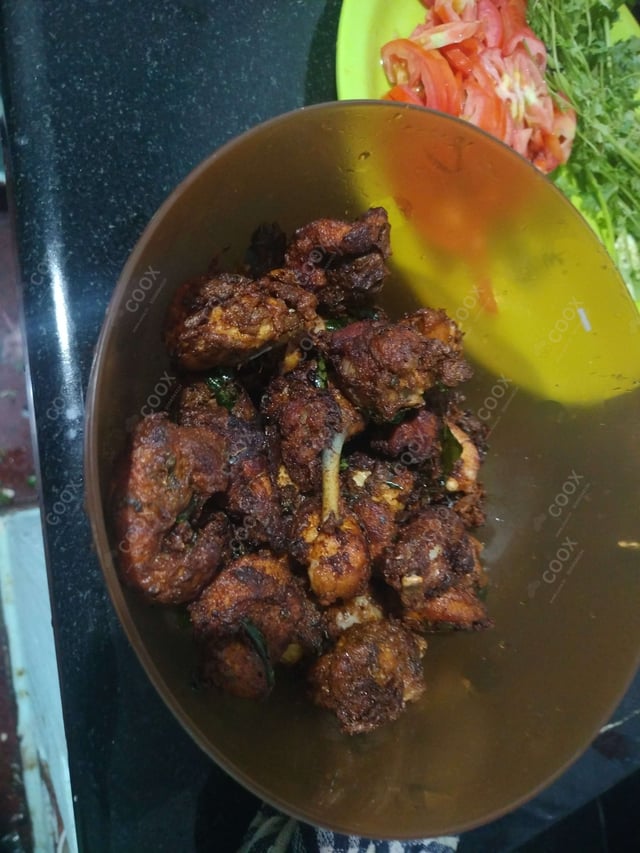 Tasty Chicken 65 cooked by COOX chefs cooks during occasions parties events at home