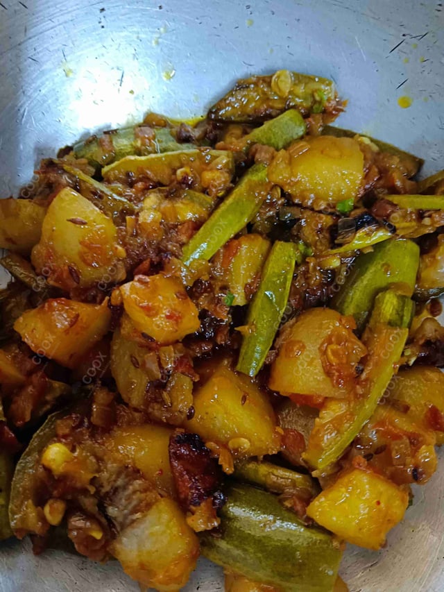 Tasty Aloo Parwal cooked by COOX chefs cooks during occasions parties events at home