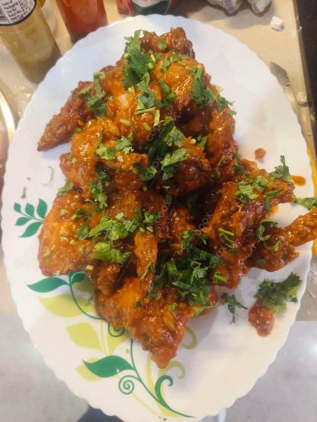 Tasty Chicken Wings cooked by COOX chefs cooks during occasions parties events at home