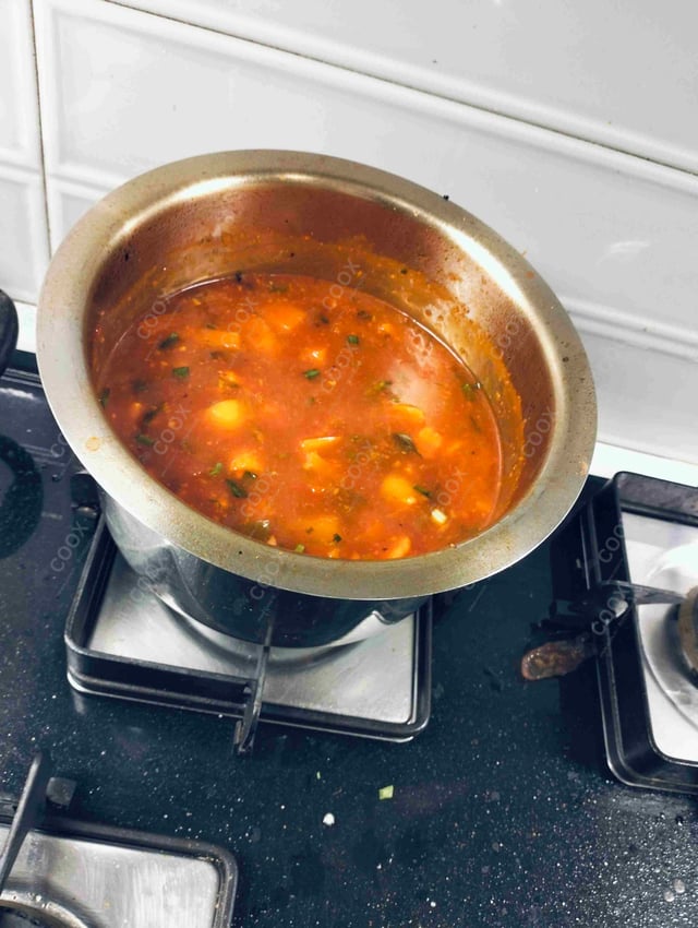 Tasty Mix Veg in Schezwan Sauce cooked by COOX chefs cooks during occasions parties events at home