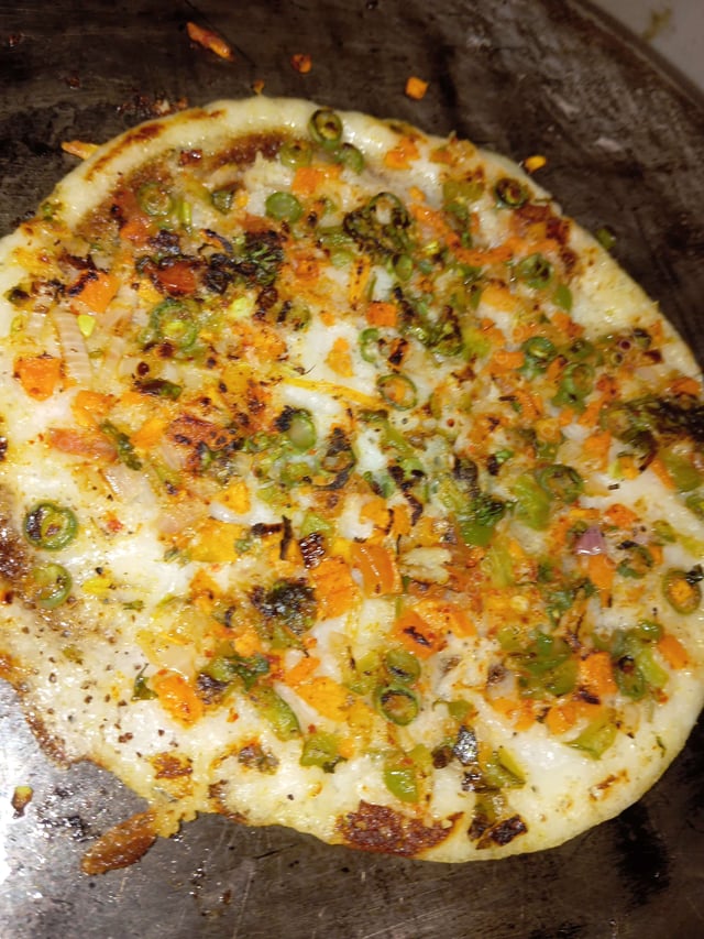 Tasty Mixed Veg Uttappam cooked by COOX chefs cooks during occasions parties events at home