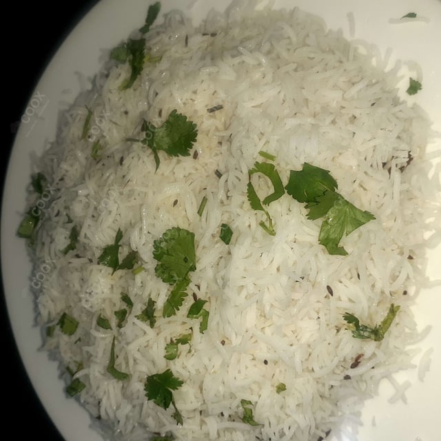 Tasty Jeera Rice cooked by COOX chefs cooks during occasions parties events at home