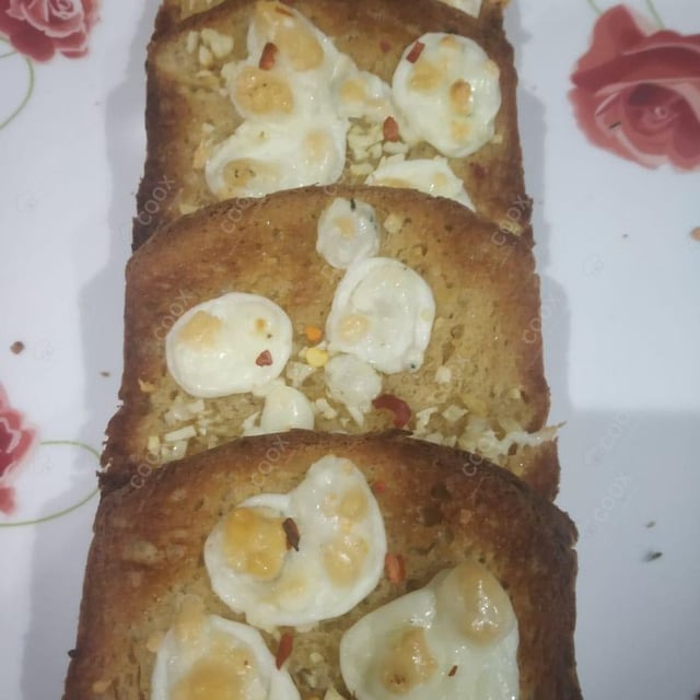 Tasty Garlic Bread with Cheese cooked by COOX chefs cooks during occasions parties events at home