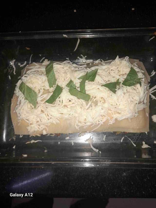 Tasty Veg Lasagna cooked by COOX chefs cooks during occasions parties events at home