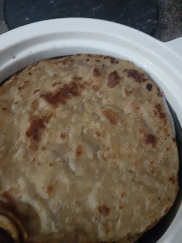 Tasty Lachha Paranthas cooked by COOX chefs cooks during occasions parties events at home