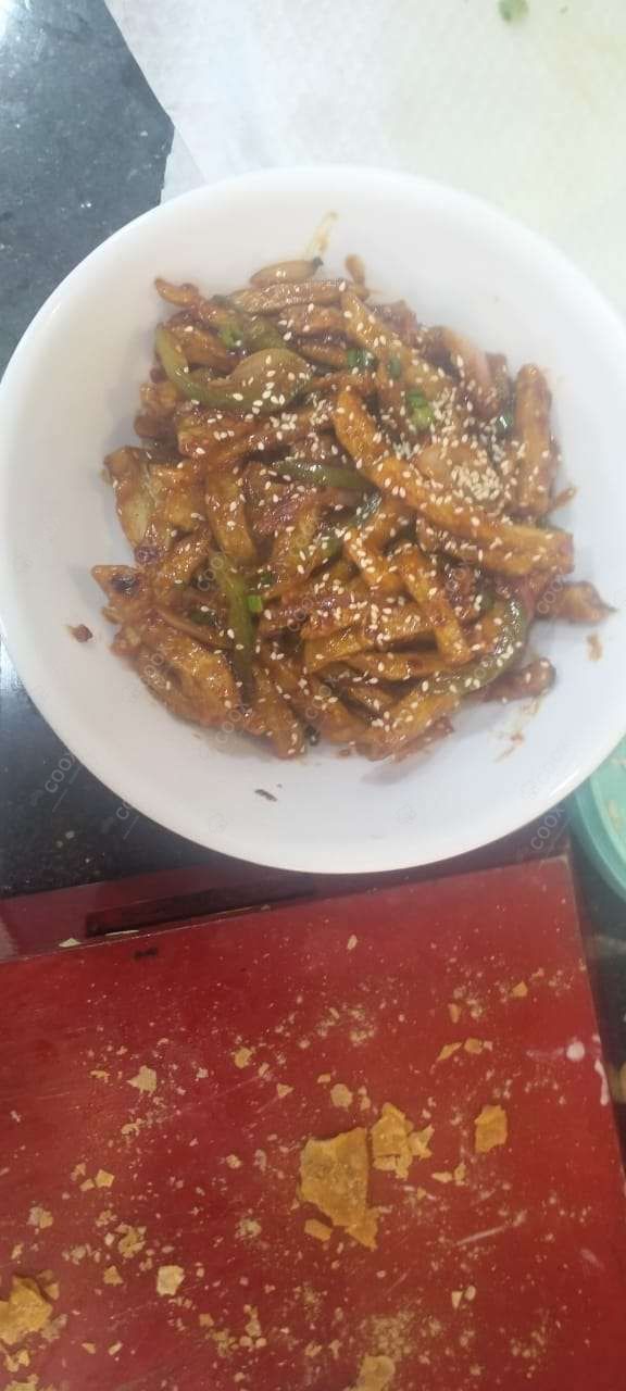 Tasty Honey Chilli Potato cooked by COOX chefs cooks during occasions parties events at home