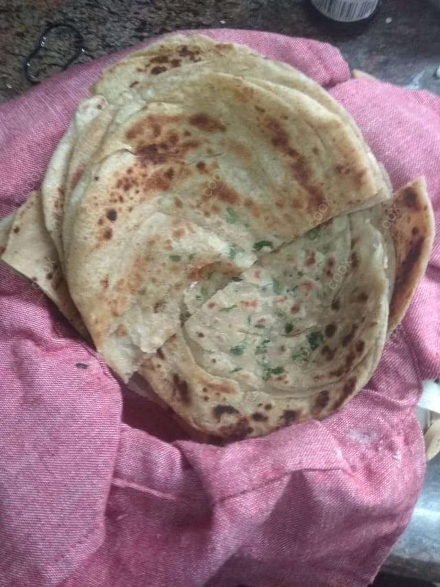 Tasty Lachha Paranthas cooked by COOX chefs cooks during occasions parties events at home