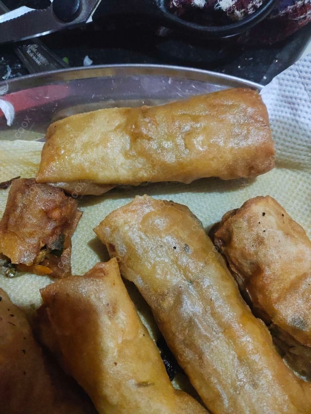 Tasty Chicken Spring Rolls cooked by COOX chefs cooks during occasions parties events at home