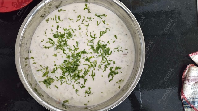 Tasty Cucumber Raita cooked by COOX chefs cooks during occasions parties events at home