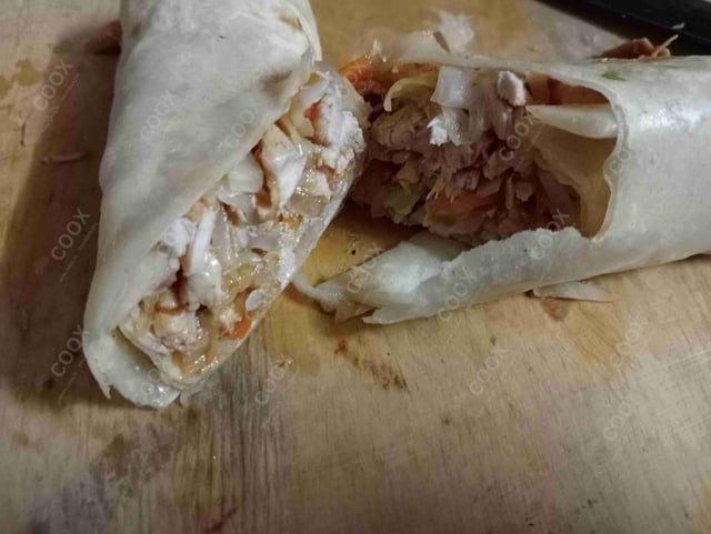 Tasty Chicken Kathi Rolls cooked by COOX chefs cooks during occasions parties events at home