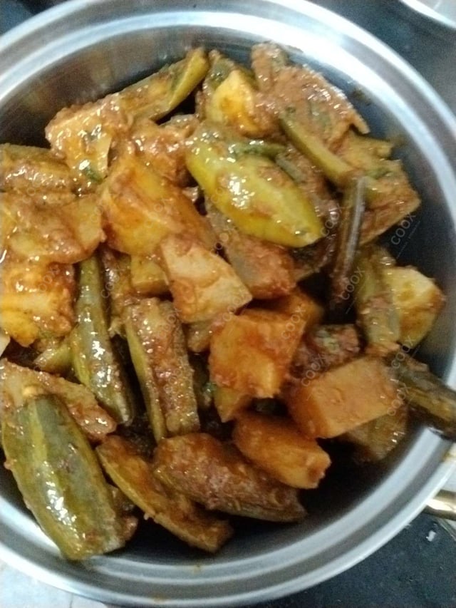Tasty Aloo Parwal cooked by COOX chefs cooks during occasions parties events at home