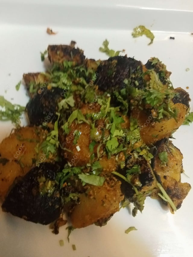 Tasty Tandoori Aloo cooked by COOX chefs cooks during occasions parties events at home