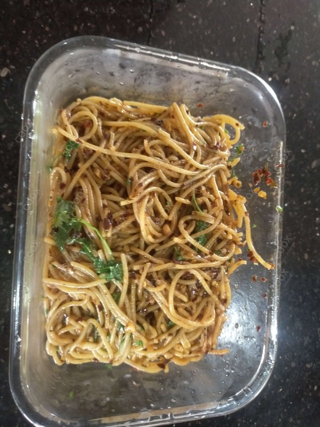 Tasty Spaghetti Aglio e Olio cooked by COOX chefs cooks during occasions parties events at home