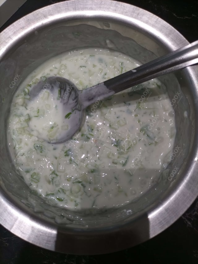 Tasty Cucumber Raita cooked by COOX chefs cooks during occasions parties events at home