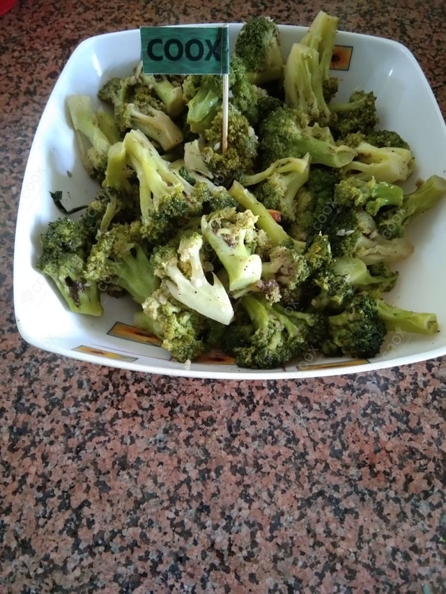 Tasty Masala Broccoli cooked by COOX chefs cooks during occasions parties events at home