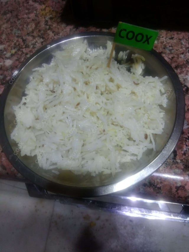 Tasty Jeera Rice cooked by COOX chefs cooks during occasions parties events at home