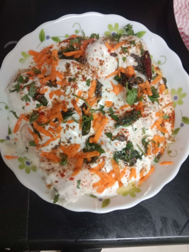 Tasty Dahi Vada cooked by COOX chefs cooks during occasions parties events at home