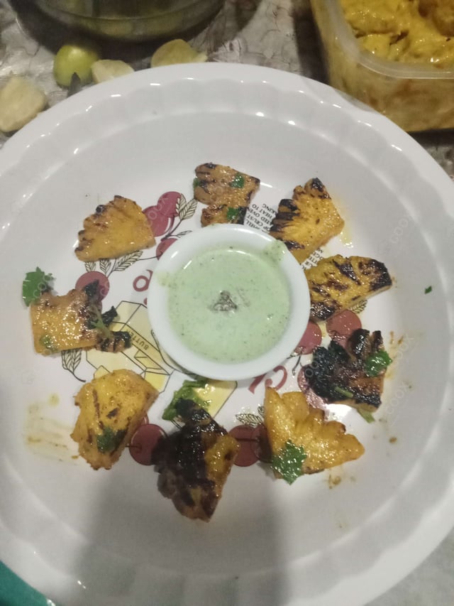Tasty Tandoori Pineapple cooked by COOX chefs cooks during occasions parties events at home