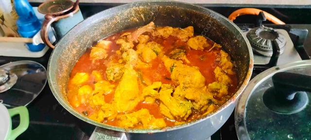 Tasty Chettinad Chicken cooked by COOX chefs cooks during occasions parties events at home