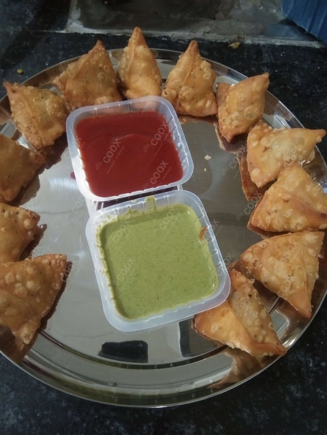 Tasty Mini Samosas cooked by COOX chefs cooks during occasions parties events at home