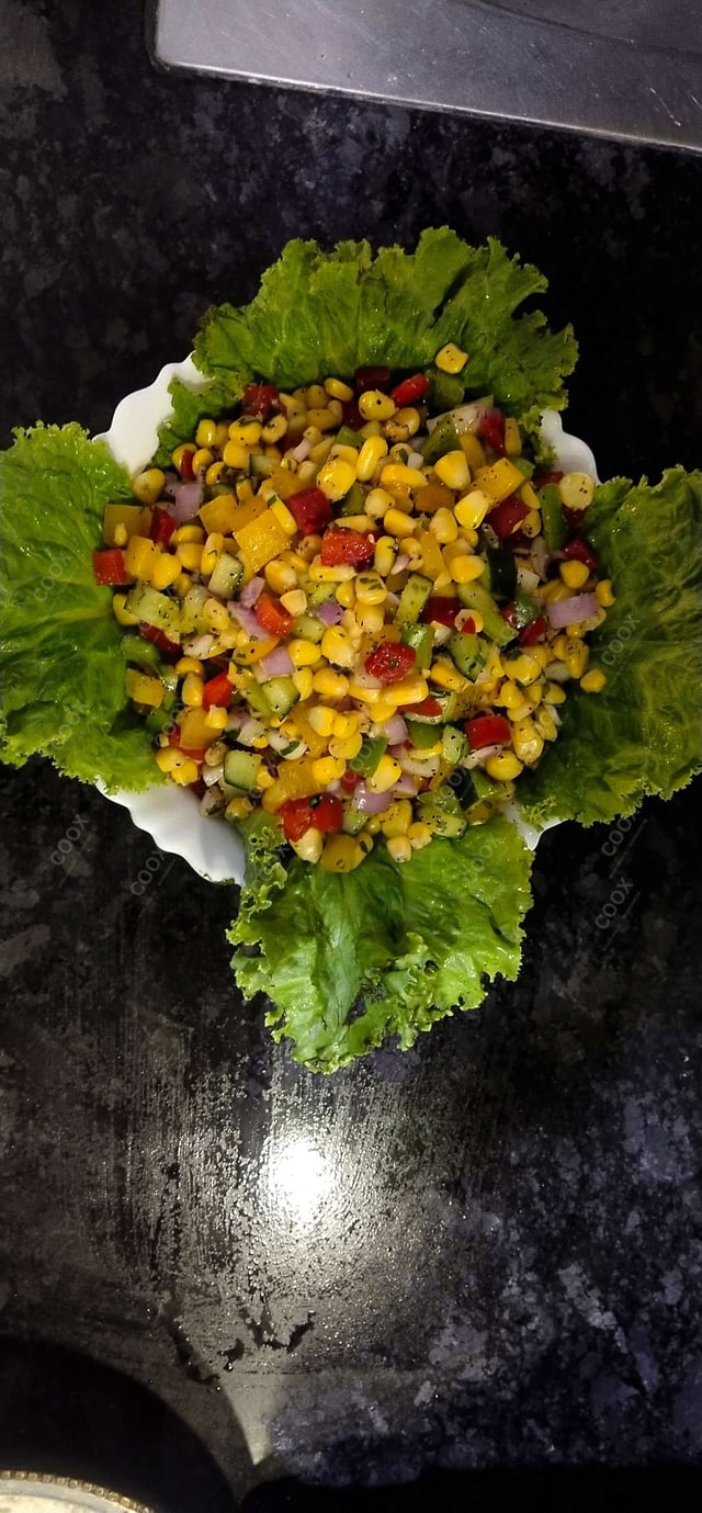 Tasty Corn Chaat cooked by COOX chefs cooks during occasions parties events at home