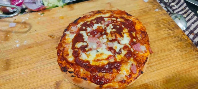 Tasty Pepperoni Pizza cooked by COOX chefs cooks during occasions parties events at home