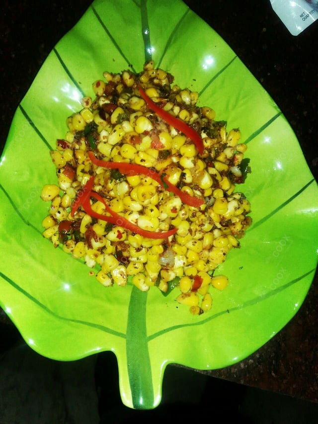 Tasty Corn Chaat cooked by COOX chefs cooks during occasions parties events at home
