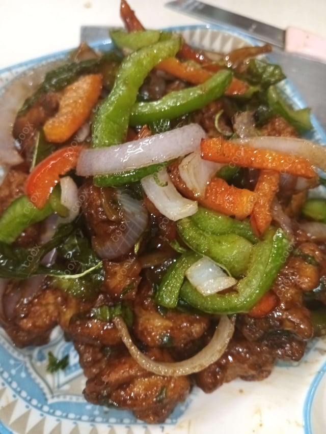 Tasty Thai Basil Chicken cooked by COOX chefs cooks during occasions parties events at home