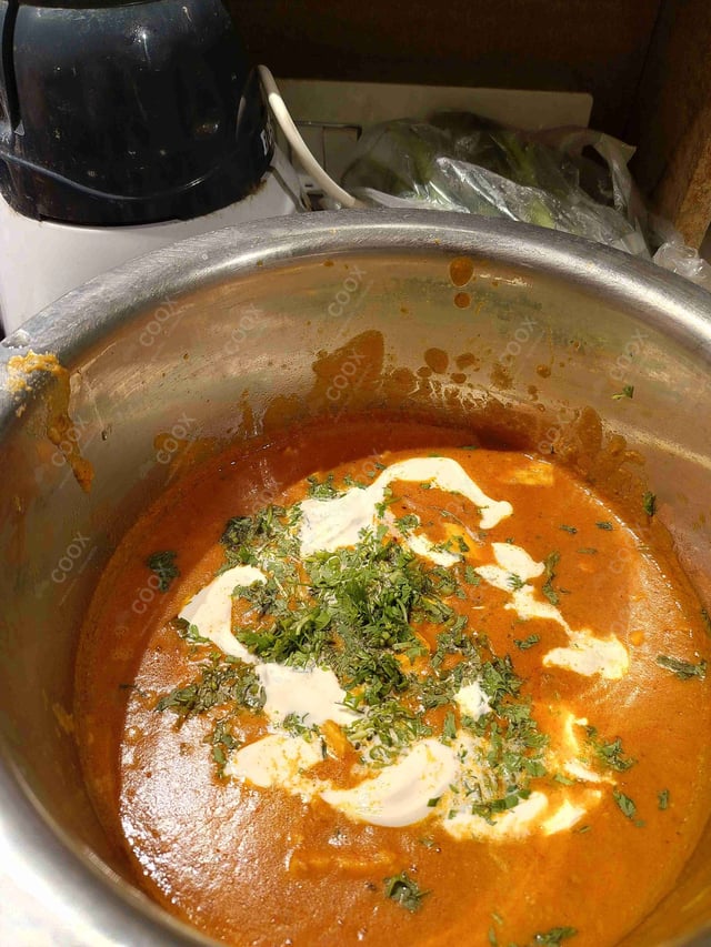 Tasty Paneer Butter Masala cooked by COOX chefs cooks during occasions parties events at home