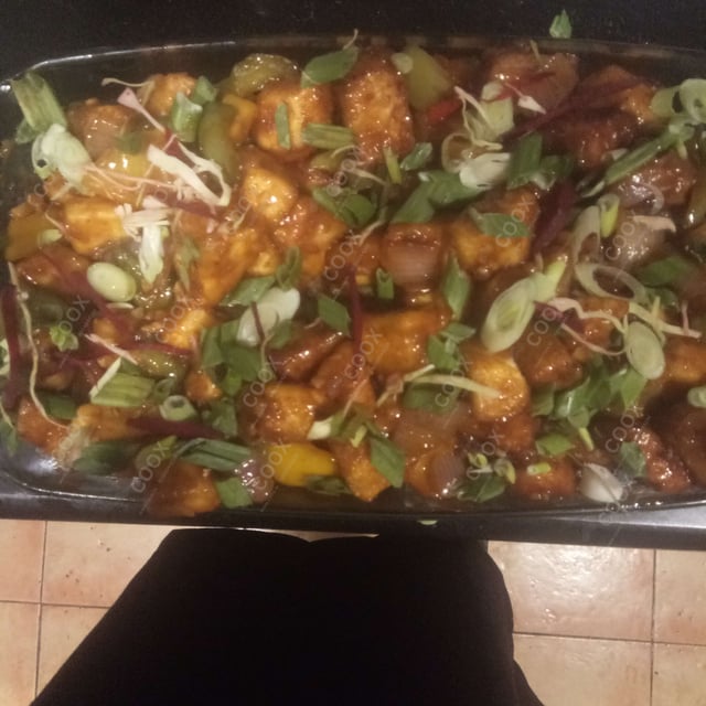 Tasty Chilli Paneer (Dry) cooked by COOX chefs cooks during occasions parties events at home