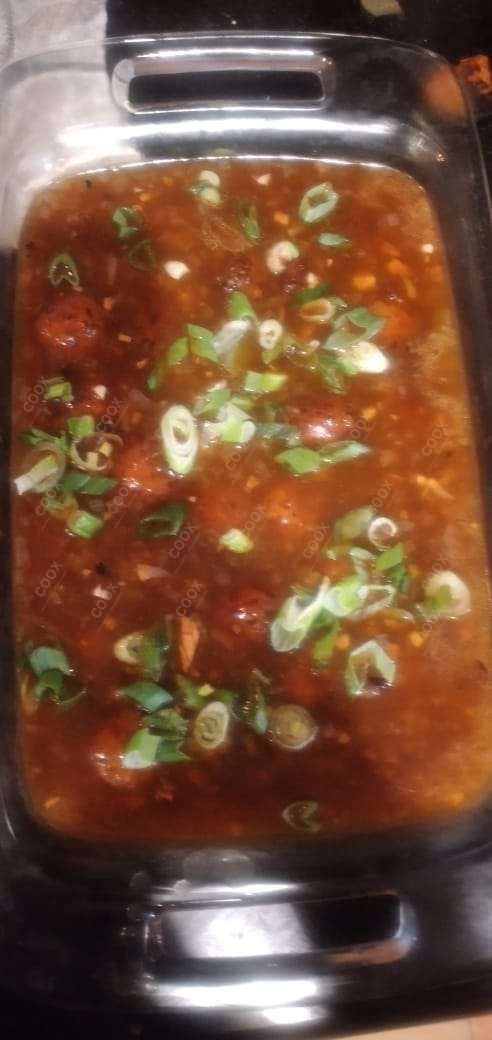 Tasty Veg Manchurian (Gravy) cooked by COOX chefs cooks during occasions parties events at home