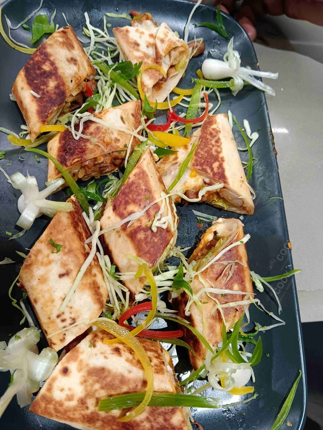 Tasty Veg Burritos cooked by COOX chefs cooks during occasions parties events at home