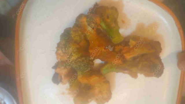 Tasty Tandoori Broccoli cooked by COOX chefs cooks during occasions parties events at home