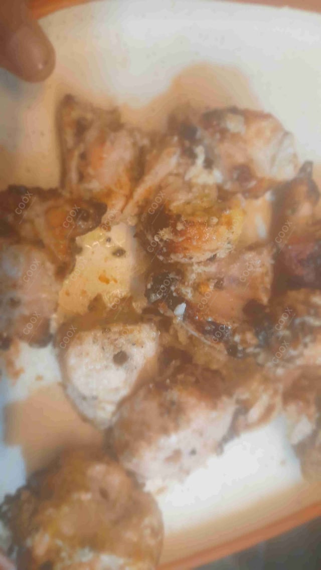 Tasty Murgh Malai Tikka cooked by COOX chefs cooks during occasions parties events at home