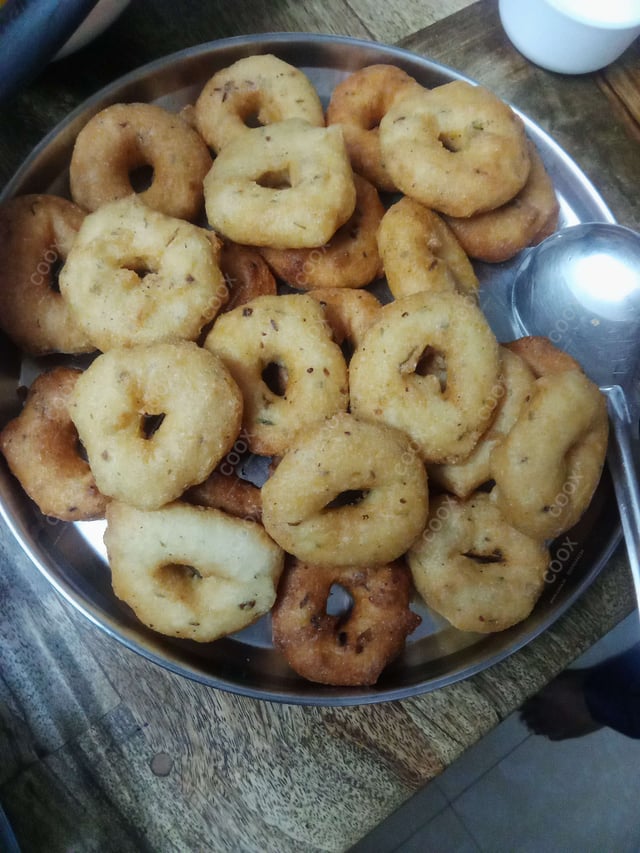 Tasty Medu Vada cooked by COOX chefs cooks during occasions parties events at home
