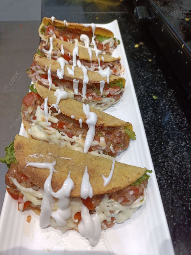 Tasty Veg Taco cooked by COOX chefs cooks during occasions parties events at home