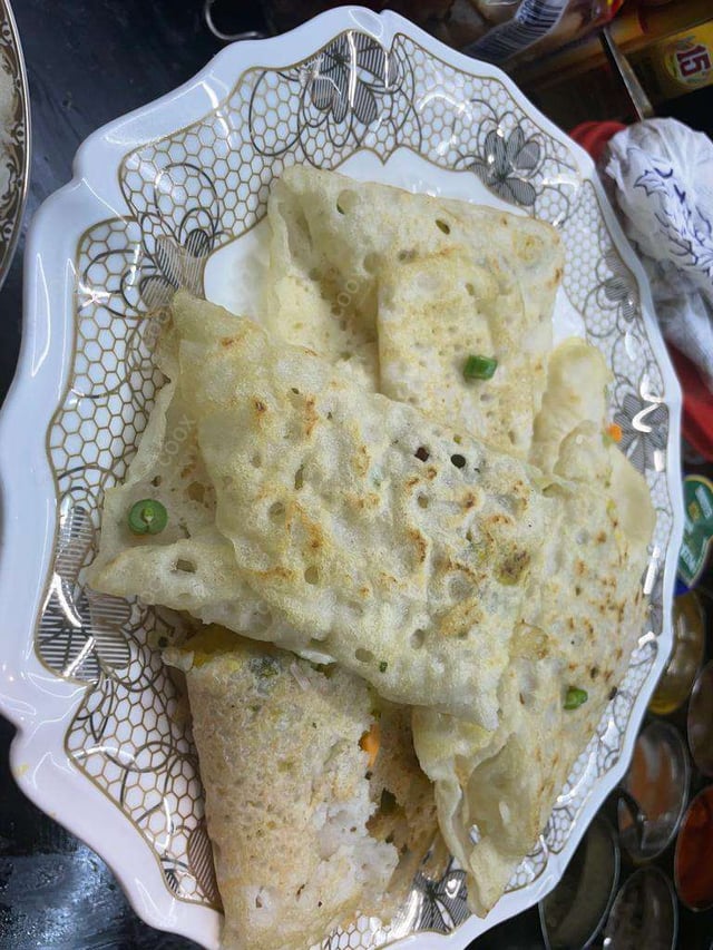 Tasty Mixed Veg Uttappam cooked by COOX chefs cooks during occasions parties events at home