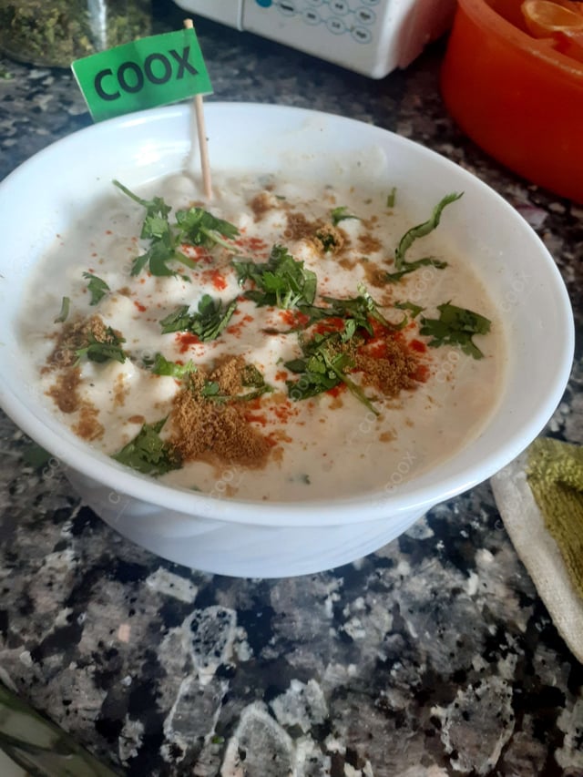 Tasty Aloo Gobhi cooked by COOX chefs cooks during occasions parties events at home