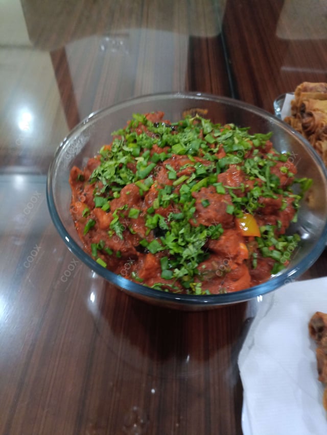 Tasty Chicken Manchurian (Dry) cooked by COOX chefs cooks during occasions parties events at home