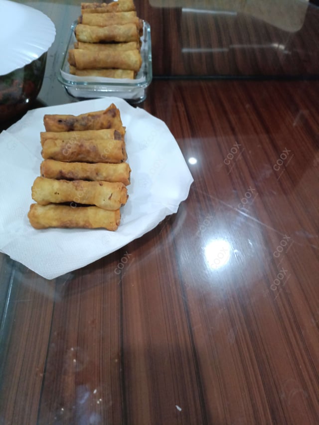 Tasty Chicken Spring Rolls cooked by COOX chefs cooks during occasions parties events at home
