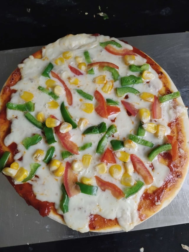 Tasty Margherita Pizza cooked by COOX chefs cooks during occasions parties events at home