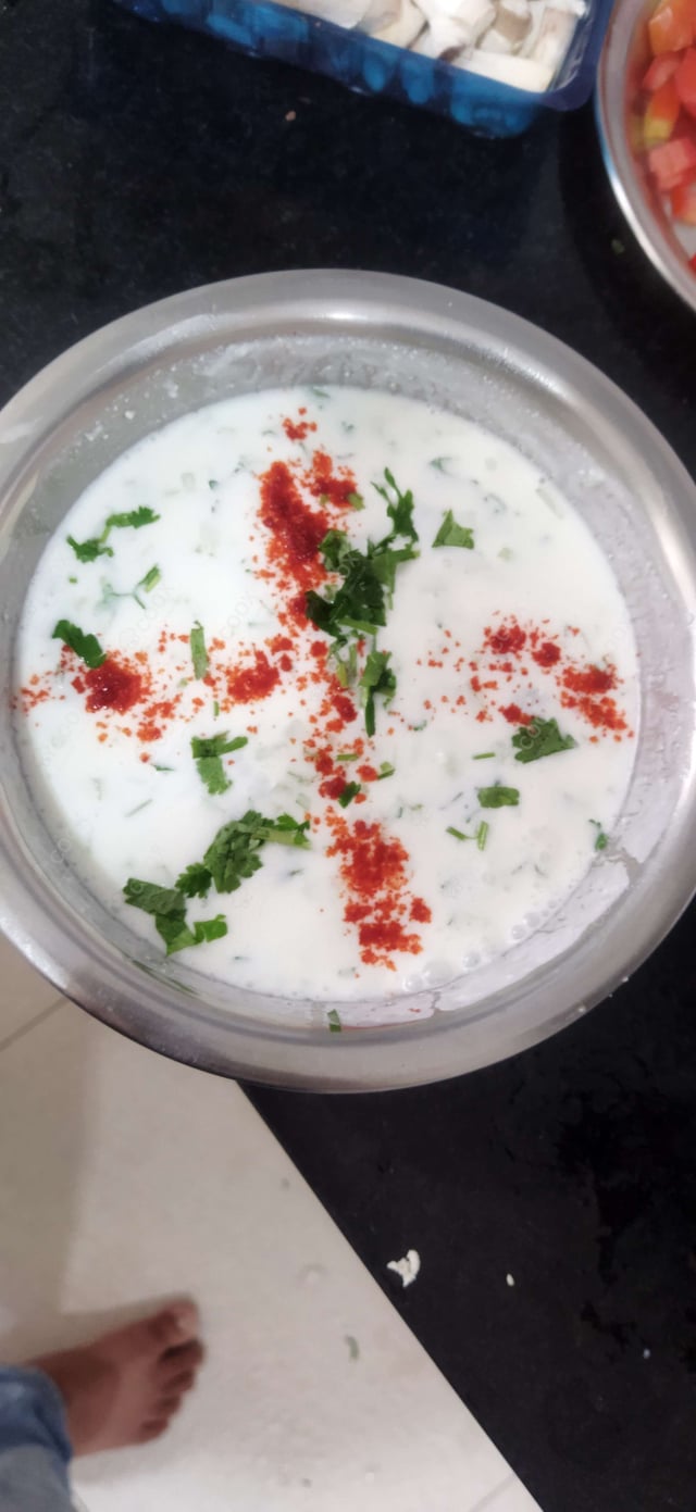 Tasty Cucumber Raita cooked by COOX chefs cooks during occasions parties events at home
