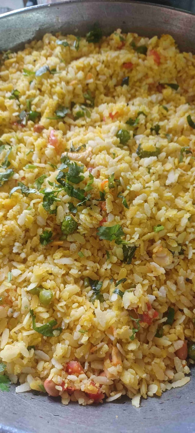 Tasty Poha cooked by COOX chefs cooks during occasions parties events at home