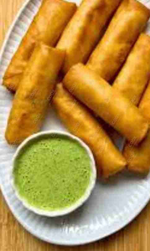 Tasty Chicken Spring Rolls cooked by COOX chefs cooks during occasions parties events at home