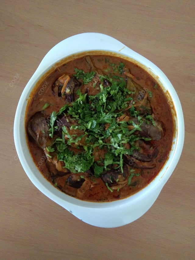 Tasty Baingan ki Sabzi cooked by COOX chefs cooks during occasions parties events at home