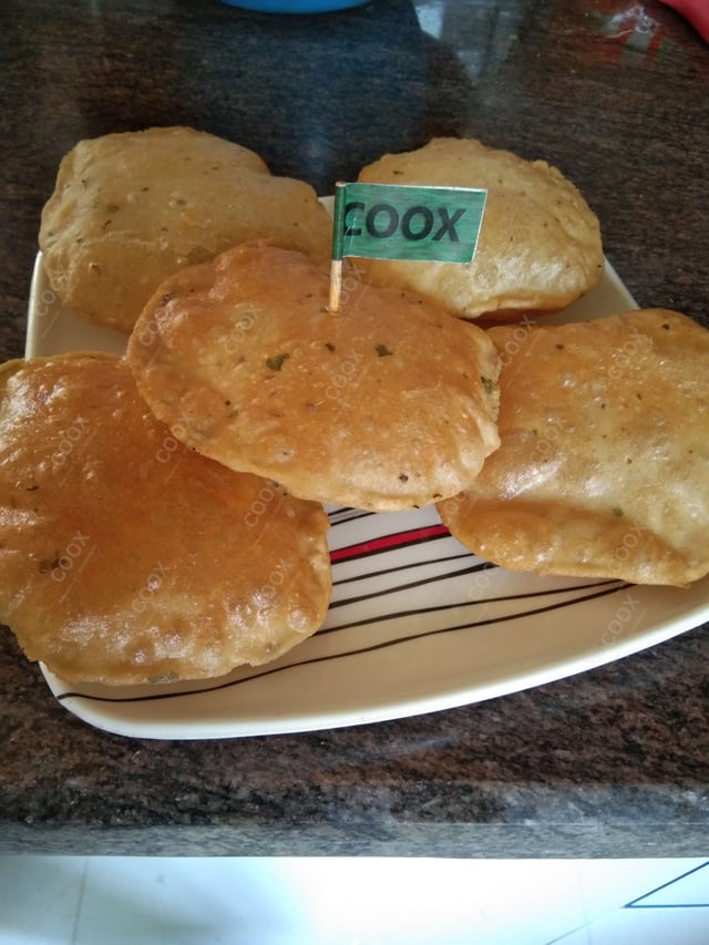 Tasty Pooris & Bedmis cooked by COOX chefs cooks during occasions parties events at home