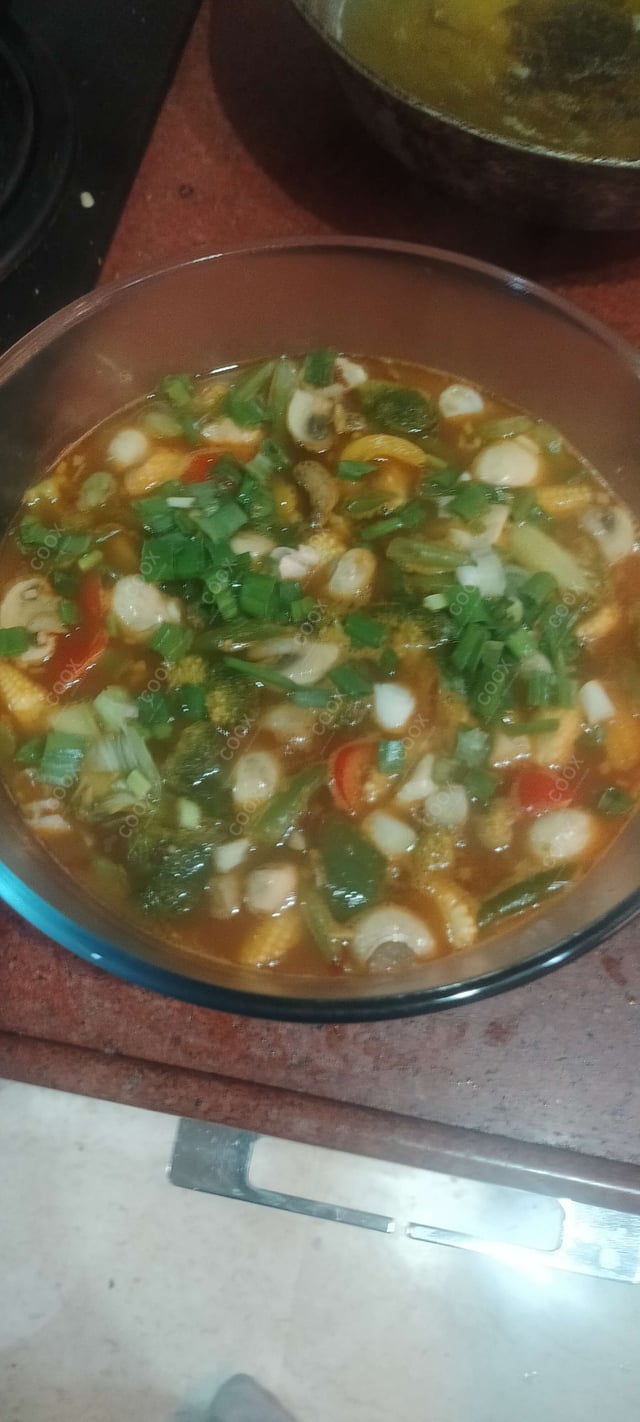 Delicious Mix Veg in Schezwan Sauce prepared by COOX